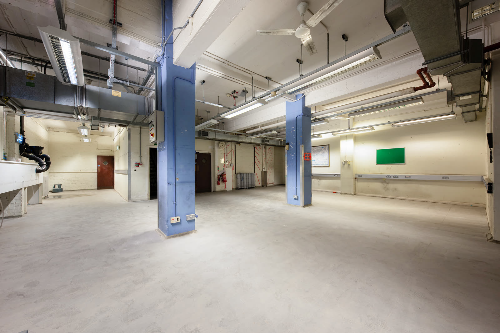 200 Baker Street basement, another angle showing the original industrial fit-out