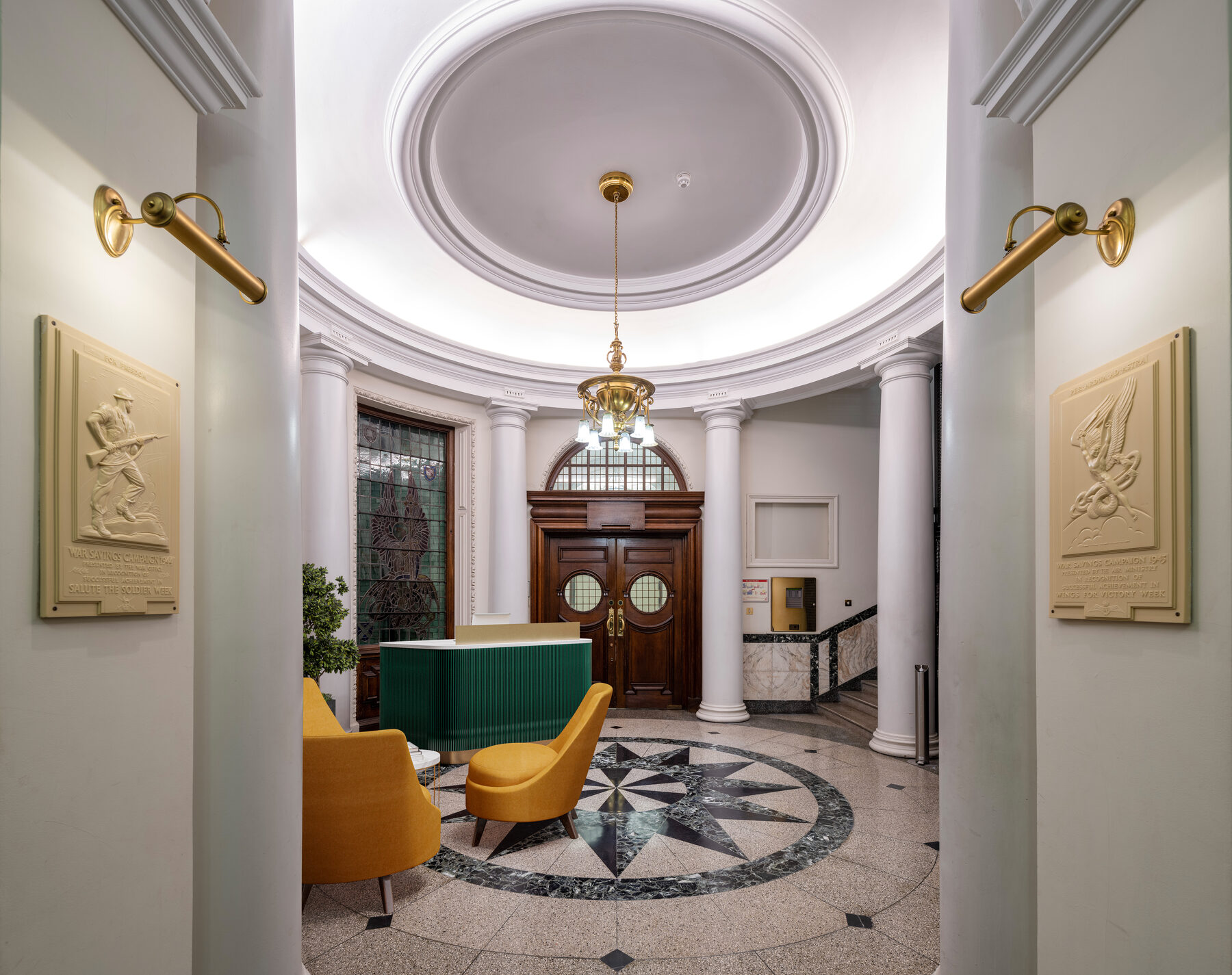 Holborn Town Hall reception rotunda, staged with concierge desk and seating