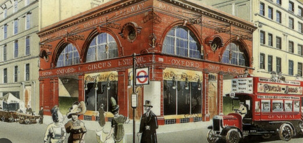 Coloured postcard of Oxford Circus Station from the same period, with a General omnibus passing the corner